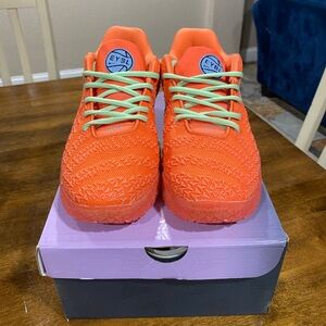 Nike Orange Athletic Shoes with Green Laces